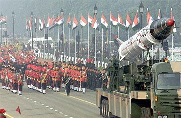 Soldiers roll out the Agni missile during rehearsal for the Republic Day parade in New Delhi