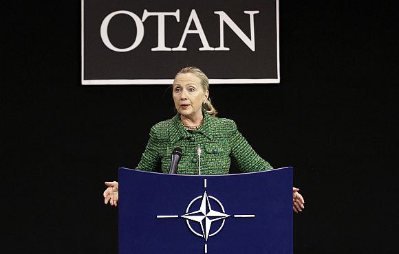 US Secretary of State Clinton holds a news conference after a NATO foreign ministers meeting at the alliance headquarters in Brussels