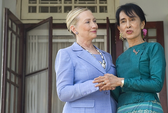 US Secretary of State Hillary Clinton and Myanmar's pro-democracy opposition leader Aung San Suu Kyi speak to the media at Suu Kyi's residence in Yangon on December 2. Clinton held a second meeting with Suu Kyi as she wrapped up a landmark visit to Myanmar which saw the new civilian government pledge to forge ahead with political reforms and re-engage with the world community