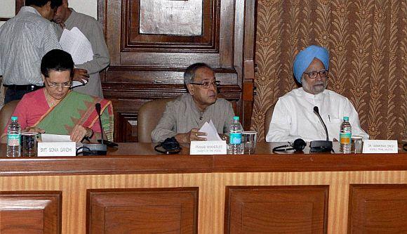 Sonia Gandhi with PM Singh and Finance Minister Pranab Mukherjee