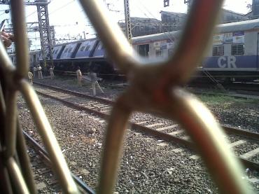 The derailed train compartment near Masjid station, Mumbai