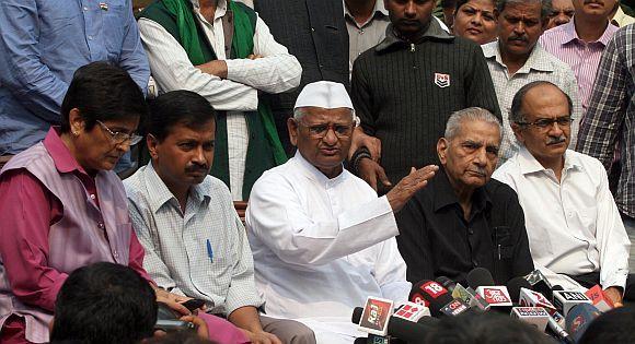 Team Anna members Kiran Bedi, Arvid Kejriwal, Shanti Bhushan and his son Prashant Bhushan