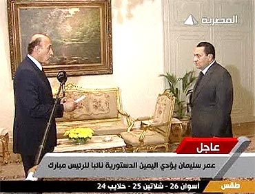 Egyptian President Hosni Mubarak swears in Omar Suleiman as vice president in Cairo, in this still image taken from video dated January 29, 2011