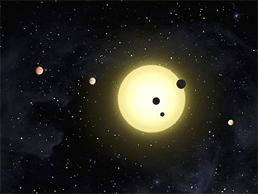 In this artist's conception released by NASA Kepler-11 is a sun-like star around which six planets orbit