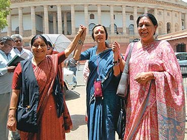 Women Opposition leaders celebrate the passage of the Bill in Rajya Sabha