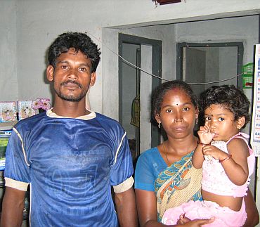 Karnan with his wife Usha and child