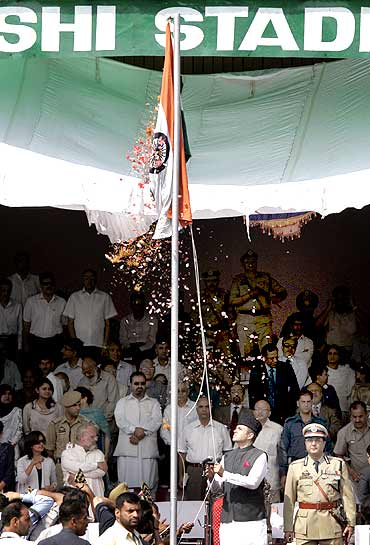 Jammu and Kashmir chief minister Omar Abdullah unfurls the national tricolour during Independence Day celebrations in Srinagar