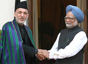 Afghan President Hamid Karzai with Dr Manmohan Singh