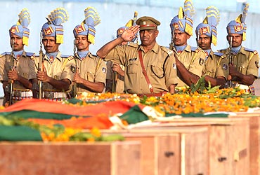 CRPF personnel pay tribute to their colleagues killed in the Dantewada massacre
