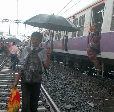 People chose to get off the local train at Ghakopar rather than wait for the line to clear