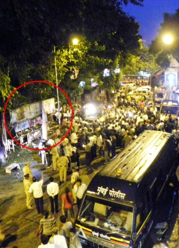 The bus stop (left) where the blasts took place at Dadar