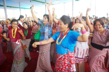 Activists of the GJM women's wing, sing and dance to celebrate the treaty signing.