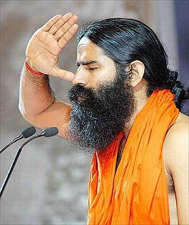 Baba Ramdev gestures during his yoga camp in New York