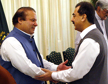Pakistan's Prime Minister Yusuf Raza Gilani with former premier Nawaz Sharif
