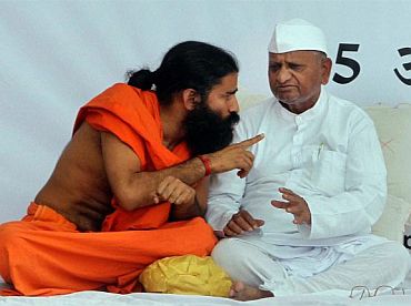 Social activist Anna Hazare with yoga guru Baba Ramdev