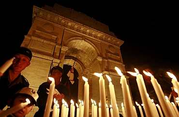 Soldiers and school children light candles during the Vijay Divas,  celebrated to mark the victory of the Indian army in the 1971 war with Pakistan