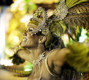 A reveller of the Vila Isabel samba school participates in the annual Carnival parade
