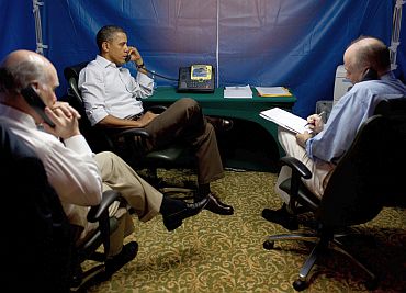 President Barack Obama is briefed on the situation in Libya during a secure conference call with National Security Advisor Tom Donilon, right, Chief of Staff Bill Daley, left, Secretary of State Hillary Clinton, Secretary of Defense Bob Gates, AFRICOM Commander General Carter Ham, and Deputy National Security Advisor Denis McDonough