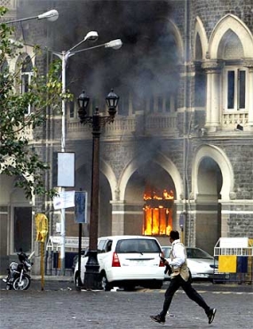 The Taj Mahal Hotel burns during the terror strike on Mumbai