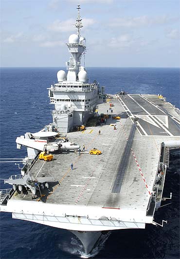 Aircrafts are seen on the deck of France's flagship Charles de Gaulle aircraft carrier in the Mediterranean. The Charles de Gaulle ran 47 air sorties against targets in Libya as France participates in the NATO no-fly zone