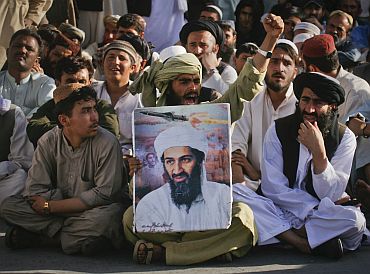 Supporters of Osama bin Laden shout anti-American slogans, after the news of his death, during a rally in Quetta, Pakistan