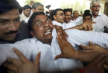 Farmers scuffle with police during a protest march at Noida in Uttar Pradesh on May 8
