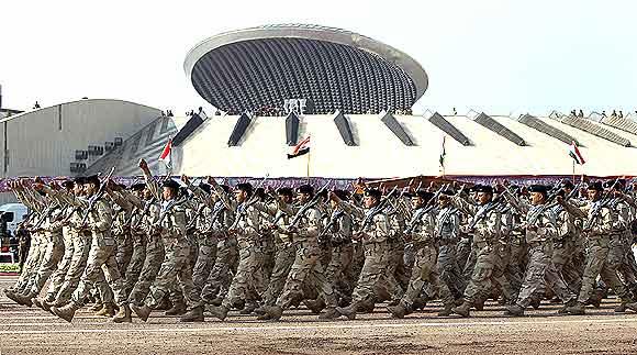 Soldiers take part in a parade marking the Iraqi Army's 90th anniversary in Baghdad