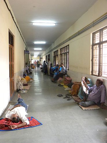Encephalitis patients' families camp in the medical college's corridors