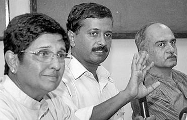 Team Anna members Kiran Bedi, Arvind Kejriwal, Prashant Bhushan