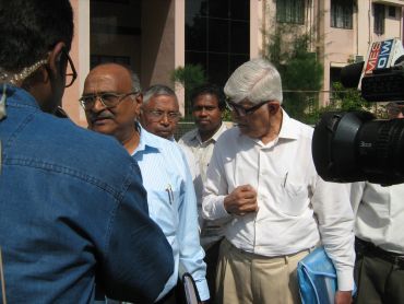 Expert committee members interact with reporters outside the Tirunelveli collectorate