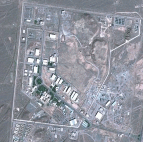 First Image: The facility in Natanz, Iran, described as the country's 'biggest nuclear facility' in 2010. Second Image: Sections of road appear to have have been developed or removed and other landscape changes are noticeable in the satellite image taken last month