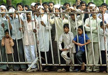 A file photo of people at a blast site outside a mosque in Malegaon