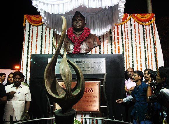 The bust of Tukaram Omble at the Girgaum Chowpatty junction along Marine Drive