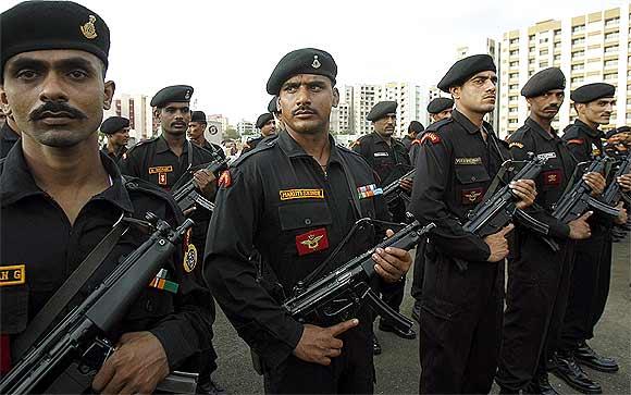 National Security Guard commandos stand during the opening of their new hub in Mumbai