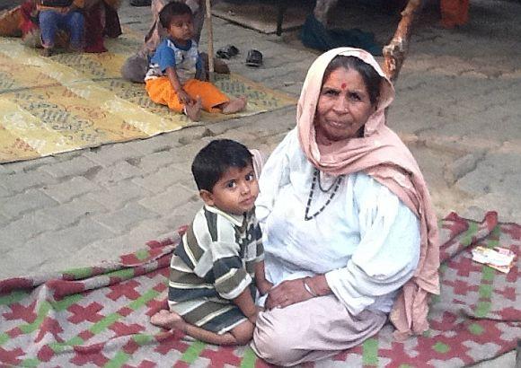 Lacchmi with her grandson