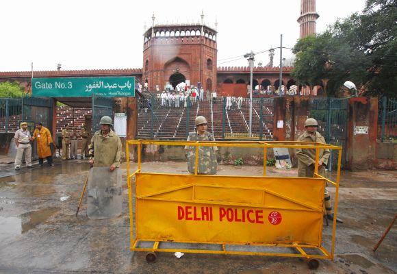 Police stand guard outside Jama Masjid in New Delhi after a shooting incident in September, 2010.