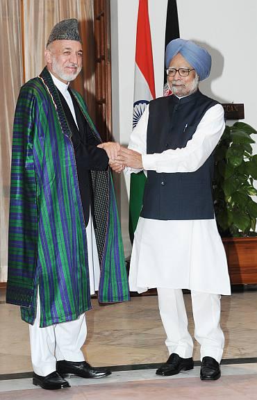 Prime Minister Dr Manmohan Singh meeting the President of Afghanistan Hamid Karzai, in New Delhi