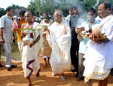 Pranab Mukherjee takes part in Durga Puja rituals at his ancestral village