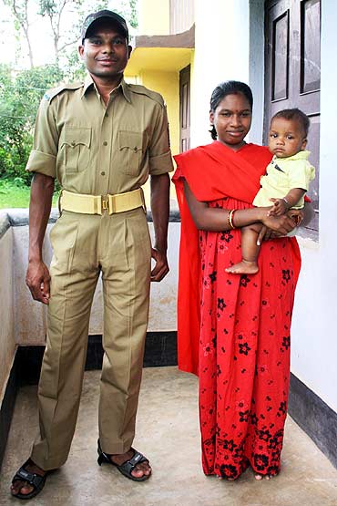 Udam Sundhi with his wife Malti and their son