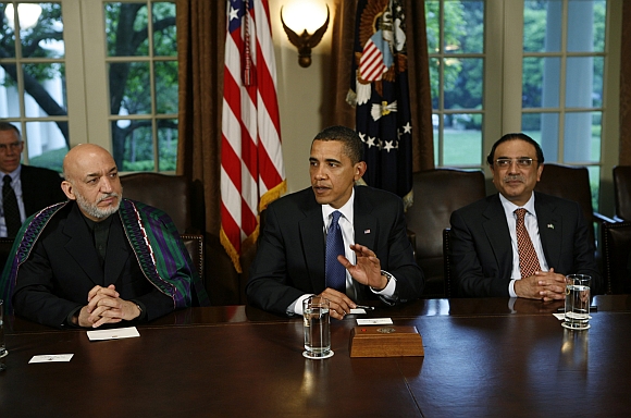 Afghan President Hamid Karzai with Obama and Zardari