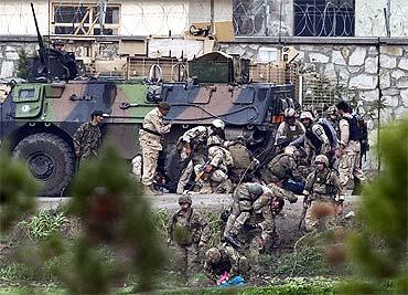 NATO and Afghan troops during a battle with Taliban insurgents who took over a building near the US embassy in Kabul