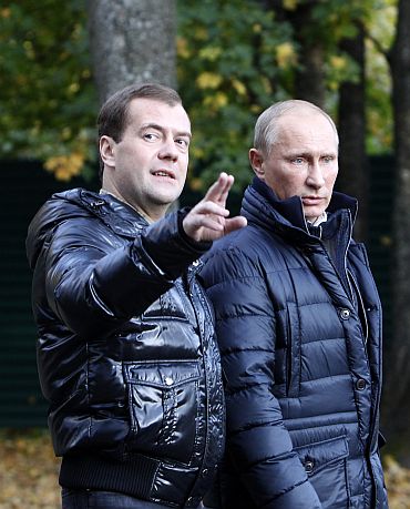 Russia's President Medvedev and walk at the residence in Zavidovo in the Tver region on Saturday