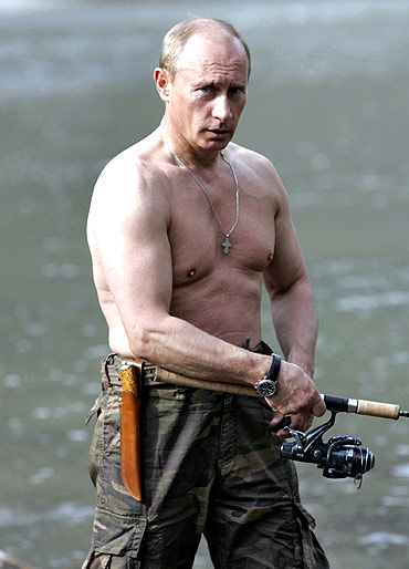 Vladimir Putin fishes in the Khemchik river in southern Siberia's Tuva region, August 15, 2007