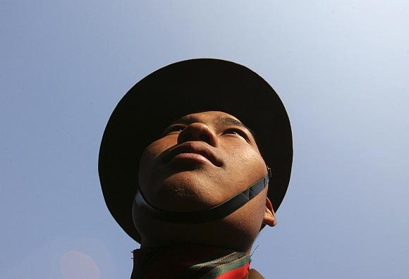 An army soldier takes part in the Vijay Diwas celebrations in Jammu