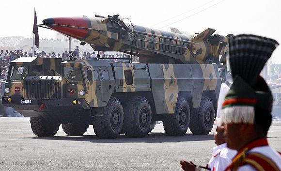 Nuclear-capable missile Shaheen II is driven past with its launcher during Pakistan National Day parade in Islamabad