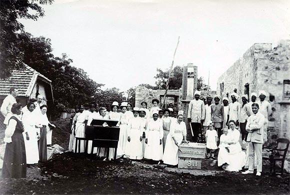 Mr and Mrs Allen Becker (far right) at the ground-breaking ceremony in Guntur with Marion, 4, and Richard, 1