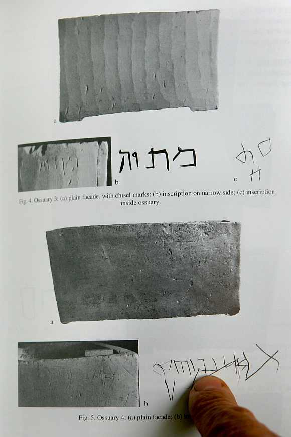 Israeli archaeologist Professor Amos Kloner points to the inscription Yeshua son of Yehosef (Jesus son of Joseph) on an ossuary