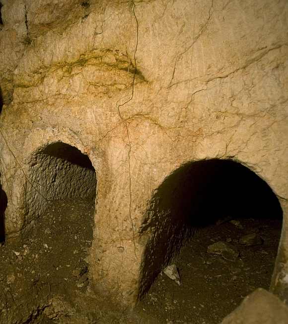 A burial cave on the edge of Jerusalem's Old City where Israeli archaeologists have said that they unearthed shroud remains from the Jesus-era