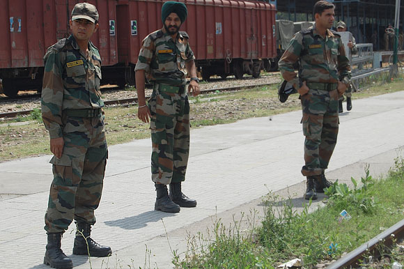 Lieutenant Navdeep, left, with colleagues during a unit movement