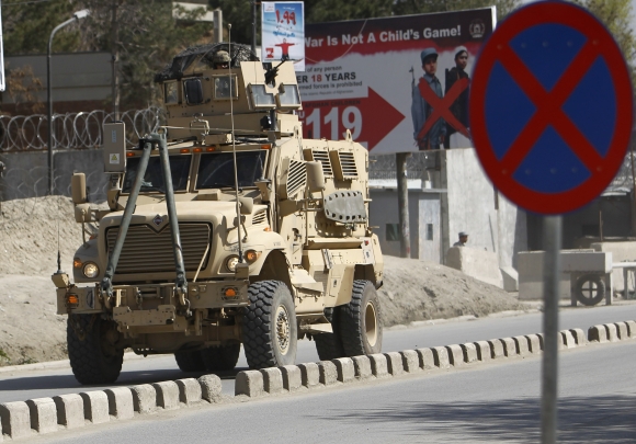US troops arrive at the scene after gunmen launched multiple attacks in Kabul
